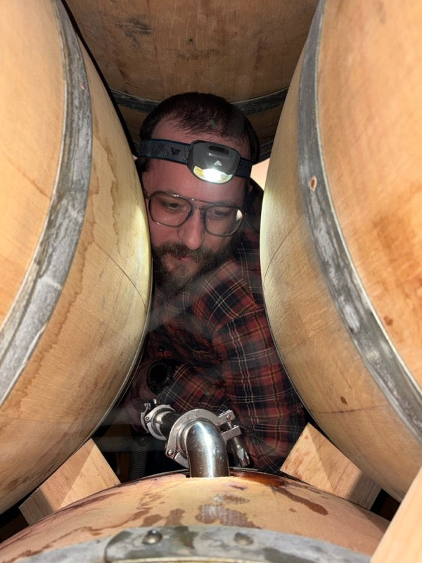 Phil Ejzak, distiller at Armen's Barrels, photographed in the barrel room